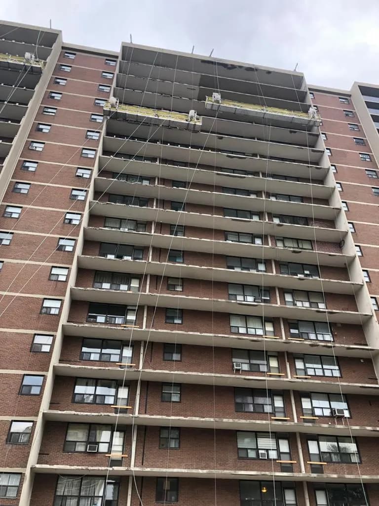 High-rise apartment building during exterior restoration