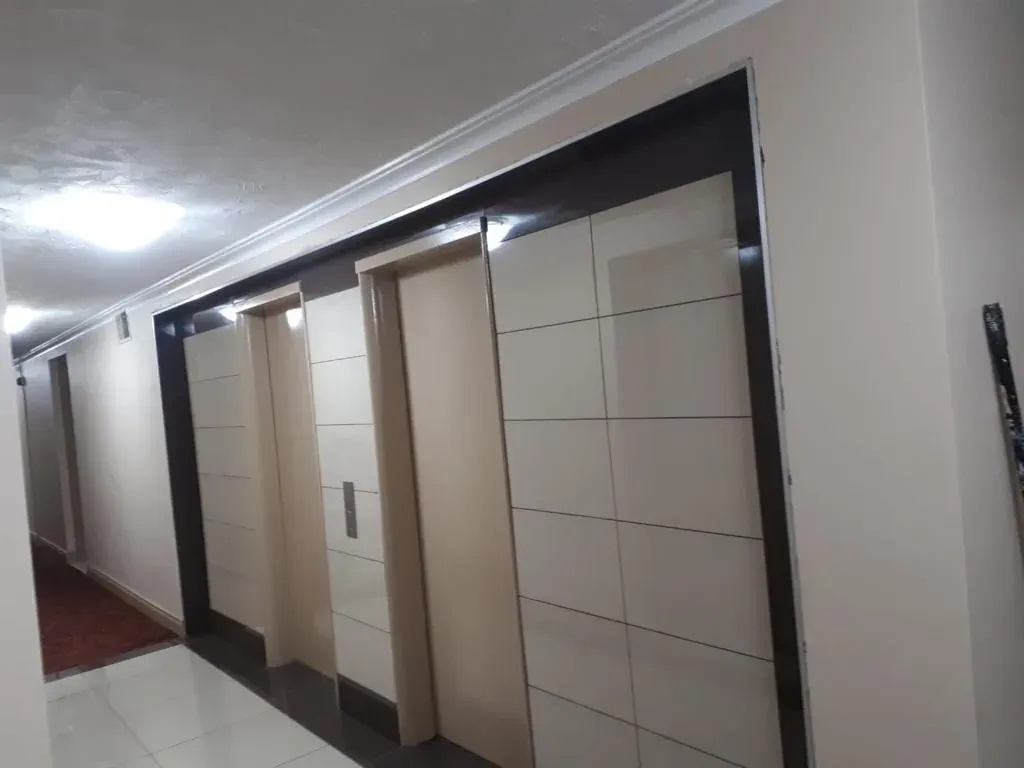 Renovated building corridor with new flooring and finishes